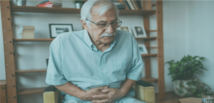 Man holding stomach